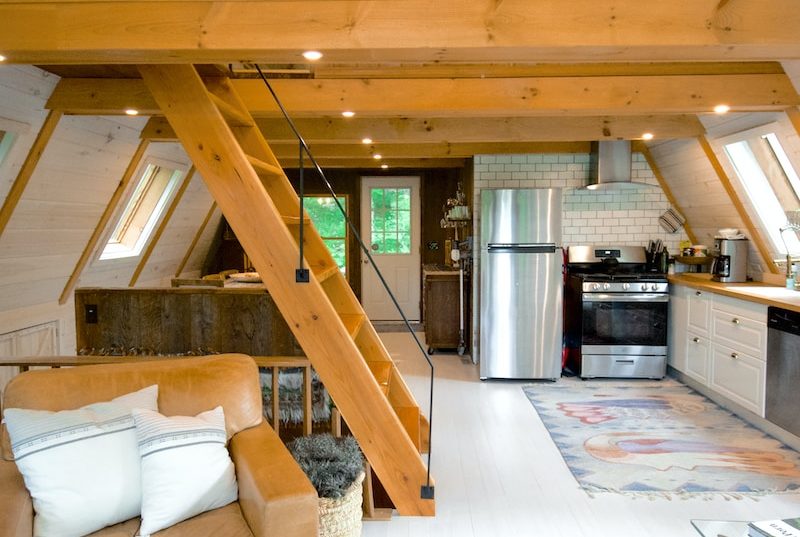 white couch beside brown wooden table